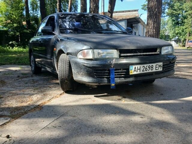 Серый Мицубиси Лансер, объемом двигателя 0 л и пробегом 111 тыс. км за 57000 $, фото 1 на Automoto.ua