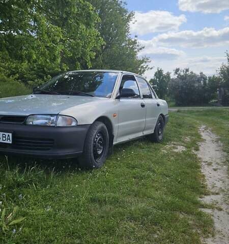 Сірий Міцубісі Lancer, об'ємом двигуна 1.3 л та пробігом 265 тис. км за 1500 $, фото 4 на Automoto.ua