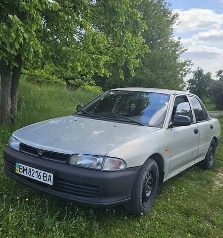 Сірий Міцубісі Lancer, об'ємом двигуна 1.3 л та пробігом 265 тис. км за 1500 $, фото 3 на Automoto.ua