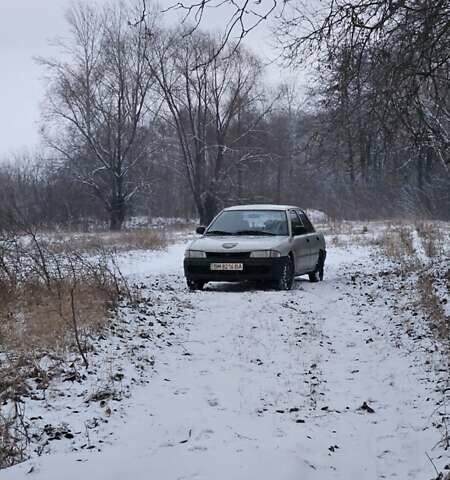 Сірий Міцубісі Lancer, об'ємом двигуна 1.3 л та пробігом 265 тис. км за 1500 $, фото 2 на Automoto.ua