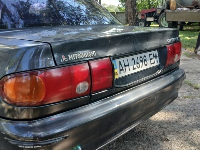 Серый Мицубиси Лансер, объемом двигателя 0 л и пробегом 111 тыс. км за 57000 $, фото 2 на Automoto.ua