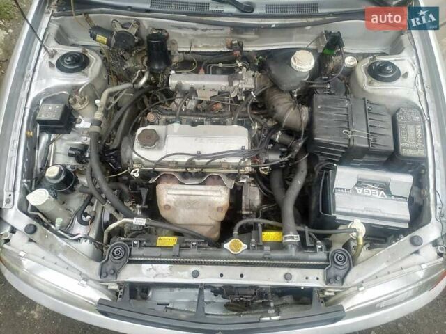 Серый Мицубиси Лансер, объемом двигателя 1.3 л и пробегом 367 тыс. км за 1050 $, фото 8 на Automoto.ua