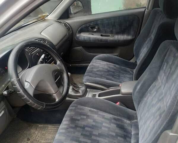 Серый Мицубиси Лансер, объемом двигателя 1.3 л и пробегом 367 тыс. км за 1050 $, фото 13 на Automoto.ua