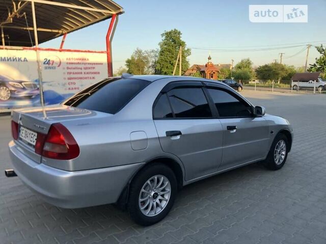 Сірий Міцубісі Lancer, об'ємом двигуна 1.3 л та пробігом 228 тис. км за 3700 $, фото 8 на Automoto.ua