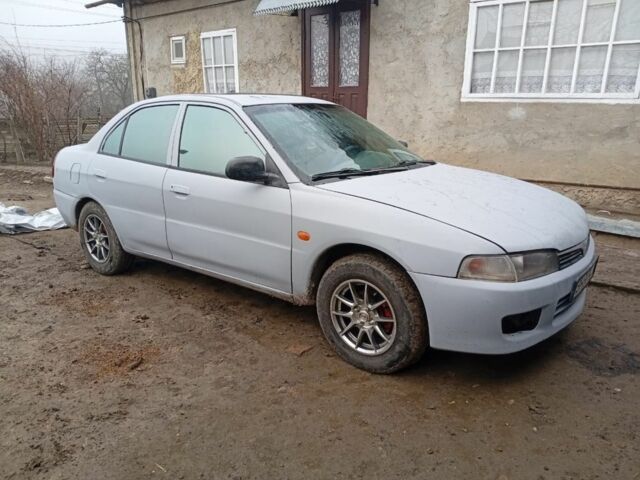 Серый Мицубиси Лансер, объемом двигателя 1.3 л и пробегом 260 тыс. км за 1700 $, фото 6 на Automoto.ua