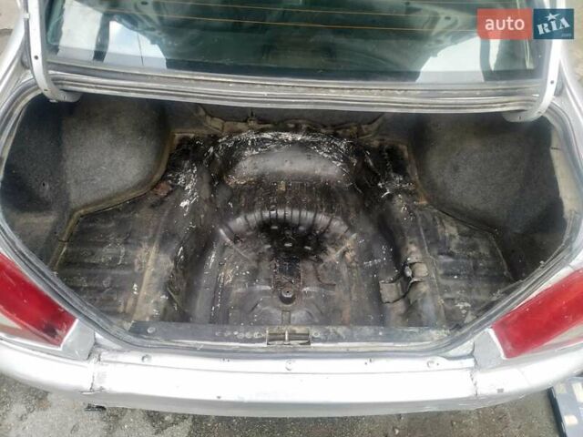 Серый Мицубиси Лансер, объемом двигателя 1.3 л и пробегом 367 тыс. км за 1050 $, фото 9 на Automoto.ua