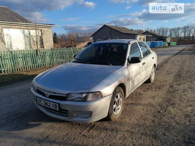 Сірий Міцубісі Lancer, об'ємом двигуна 1.3 л та пробігом 390 тис. км за 1800 $, фото 1 на Automoto.ua