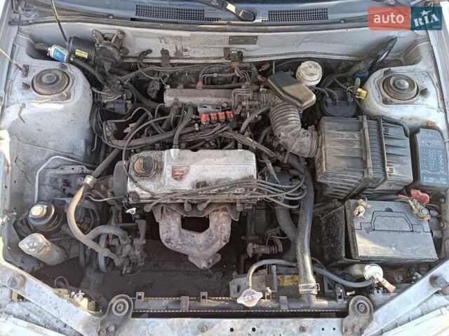 Серый Мицубиси Лансер, объемом двигателя 1.3 л и пробегом 390 тыс. км за 1800 $, фото 33 на Automoto.ua