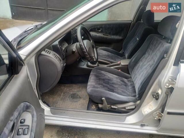 Серый Мицубиси Лансер, объемом двигателя 1.3 л и пробегом 367 тыс. км за 1050 $, фото 12 на Automoto.ua