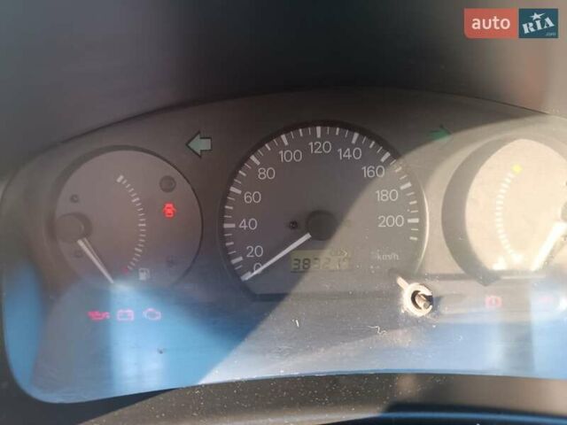 Серый Мицубиси Лансер, объемом двигателя 1.3 л и пробегом 390 тыс. км за 1800 $, фото 12 на Automoto.ua