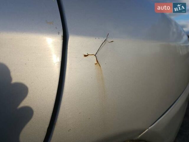 Серый Мицубиси Лансер, объемом двигателя 1.3 л и пробегом 390 тыс. км за 1800 $, фото 43 на Automoto.ua