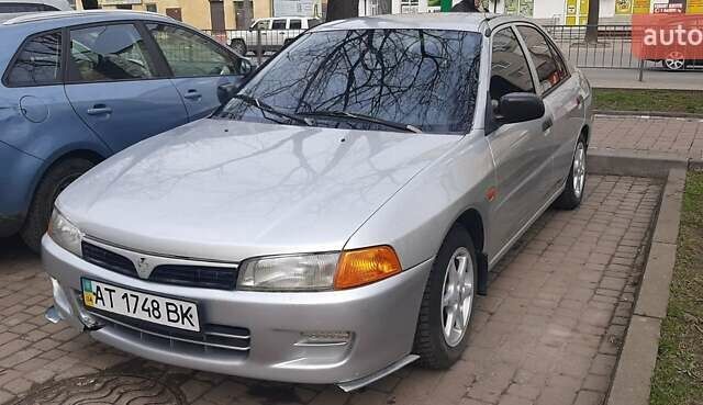 Сірий Міцубісі Lancer, об'ємом двигуна 1.3 л та пробігом 430 тис. км за 2000 $, фото 10 на Automoto.ua