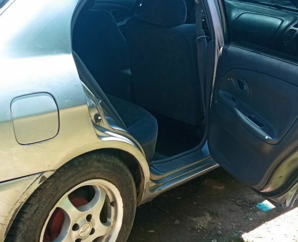 Сірий Міцубісі Lancer, об'ємом двигуна 1.3 л та пробігом 362 тис. км за 2300 $, фото 5 на Automoto.ua