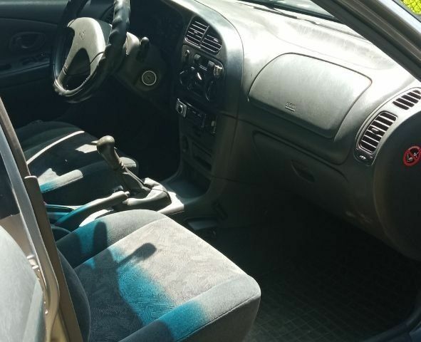Сірий Міцубісі Lancer, об'ємом двигуна 1.3 л та пробігом 362 тис. км за 2300 $, фото 3 на Automoto.ua