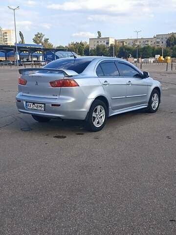 Серый Мицубиси Лансер, объемом двигателя 1.5 л и пробегом 166 тыс. км за 6999 $, фото 4 на Automoto.ua