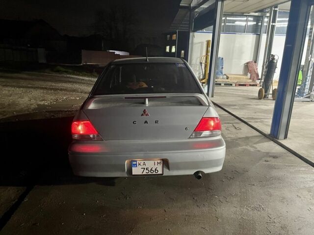 Сірий Міцубісі Lancer, об'ємом двигуна 2 л та пробігом 3 тис. км за 3850 $, фото 1 на Automoto.ua