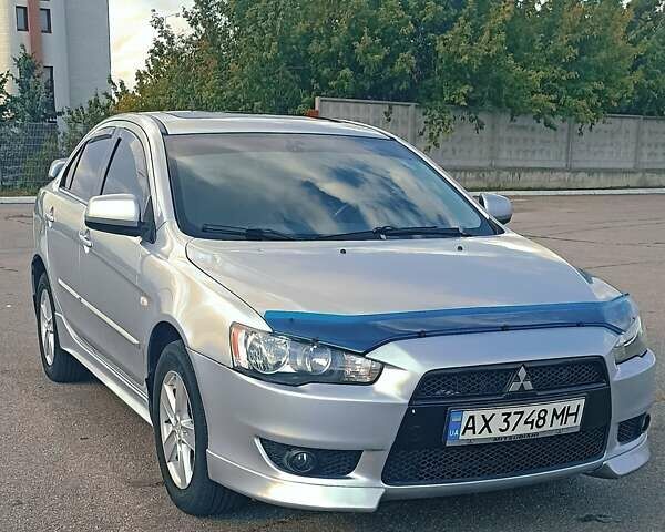 Серый Мицубиси Лансер, объемом двигателя 1.5 л и пробегом 166 тыс. км за 6999 $, фото 6 на Automoto.ua