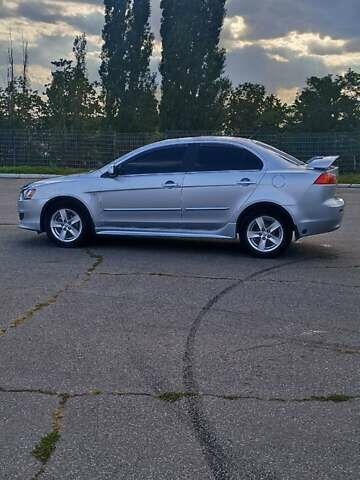 Серый Мицубиси Лансер, объемом двигателя 1.5 л и пробегом 166 тыс. км за 6999 $, фото 5 на Automoto.ua