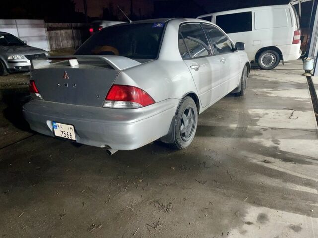 Сірий Міцубісі Lancer, об'ємом двигуна 2 л та пробігом 3 тис. км за 3850 $, фото 5 на Automoto.ua