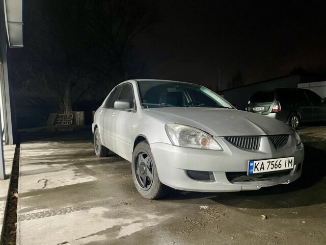 Сірий Міцубісі Lancer, об'ємом двигуна 2 л та пробігом 3 тис. км за 3850 $, фото 7 на Automoto.ua
