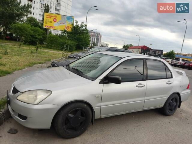 Сірий Міцубісі Lancer, об'ємом двигуна 2 л та пробігом 219 тис. км за 3500 $, фото 3 на Automoto.ua
