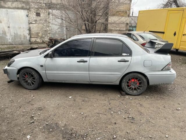 Сірий Міцубісі Lancer, об'ємом двигуна 2 л та пробігом 250 тис. км за 1500 $, фото 1 на Automoto.ua