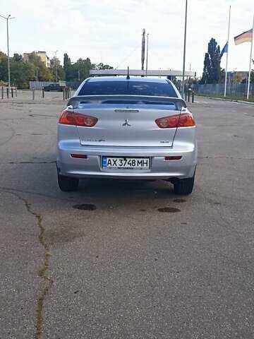 Серый Мицубиси Лансер, объемом двигателя 1.5 л и пробегом 166 тыс. км за 6999 $, фото 3 на Automoto.ua