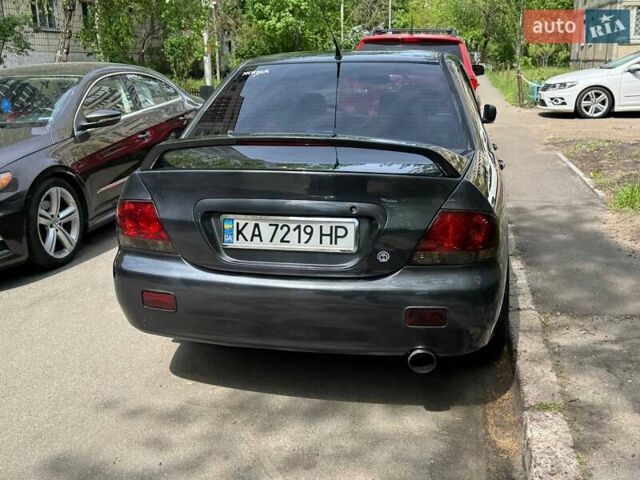 Сірий Міцубісі Lancer, об'ємом двигуна 1.6 л та пробігом 272 тис. км за 5100 $, фото 6 на Automoto.ua