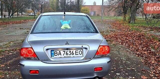 Сірий Міцубісі Lancer, об'ємом двигуна 1.6 л та пробігом 213 тис. км за 4400 $, фото 1 на Automoto.ua