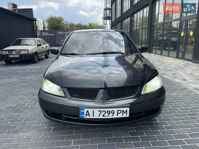 Сірий Міцубісі Lancer, об'ємом двигуна 1.6 л та пробігом 250 тис. км за 3300 $, фото 1 на Automoto.ua