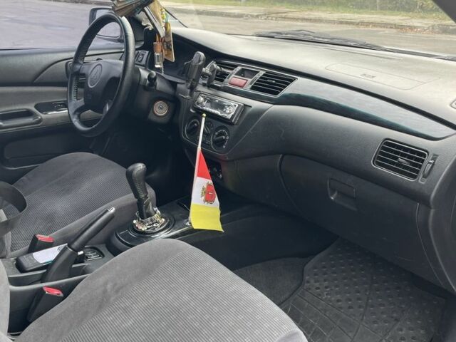 Сірий Міцубісі Lancer, об'ємом двигуна 1.6 л та пробігом 343 тис. км за 3850 $, фото 2 на Automoto.ua