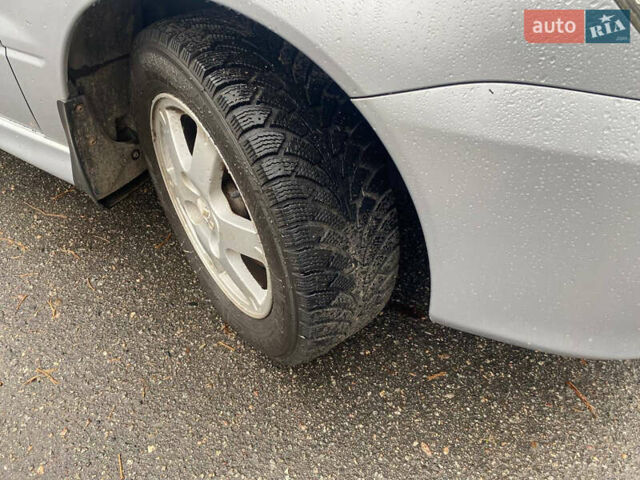 Сірий Міцубісі Lancer, об'ємом двигуна 1.6 л та пробігом 171 тис. км за 4600 $, фото 6 на Automoto.ua