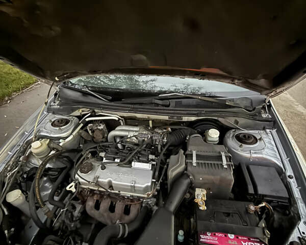 Сірий Міцубісі Lancer, об'ємом двигуна 1.58 л та пробігом 299 тис. км за 3850 $, фото 4 на Automoto.ua