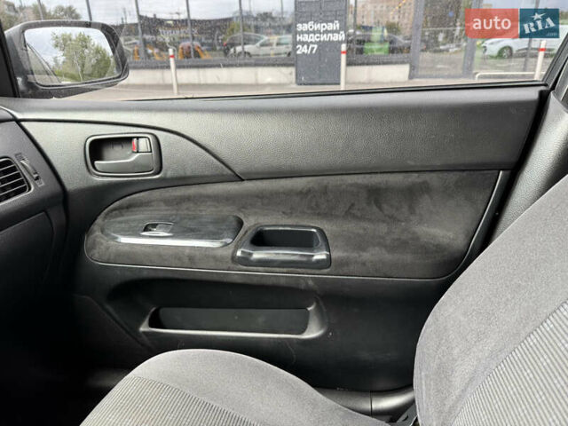 Сірий Міцубісі Lancer, об'ємом двигуна 1.6 л та пробігом 272 тис. км за 5100 $, фото 11 на Automoto.ua