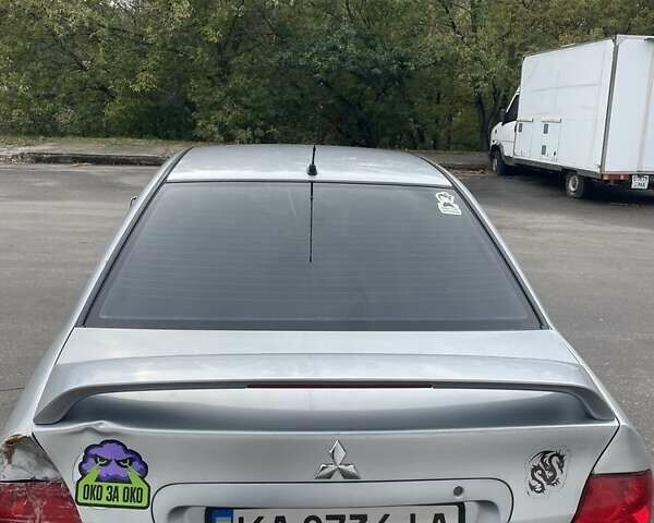 Сірий Міцубісі Lancer, об'ємом двигуна 1.6 л та пробігом 343 тис. км за 3850 $, фото 5 на Automoto.ua