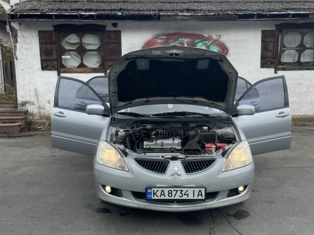 Сірий Міцубісі Lancer, об'ємом двигуна 1.6 л та пробігом 343 тис. км за 3850 $, фото 7 на Automoto.ua