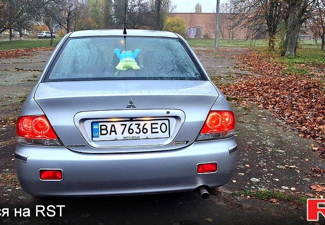 Сірий Міцубісі Lancer, об'ємом двигуна 1.6 л та пробігом 213 тис. км за 4400 $, фото 2 на Automoto.ua