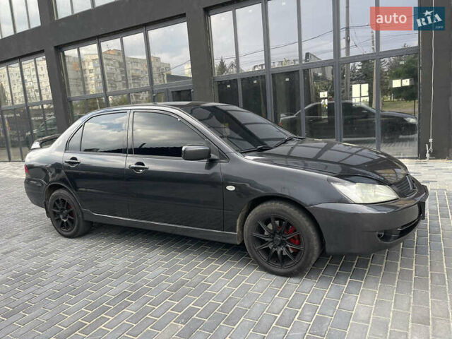 Сірий Міцубісі Lancer, об'ємом двигуна 1.6 л та пробігом 250 тис. км за 3300 $, фото 8 на Automoto.ua