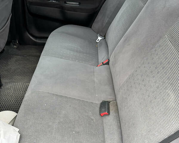 Сірий Міцубісі Lancer, об'ємом двигуна 1.6 л та пробігом 272 тис. км за 5100 $, фото 13 на Automoto.ua