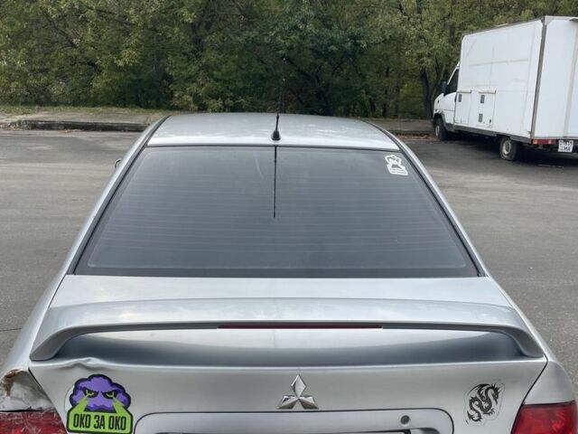 Сірий Міцубісі Lancer, об'ємом двигуна 1.6 л та пробігом 343 тис. км за 3850 $, фото 6 на Automoto.ua