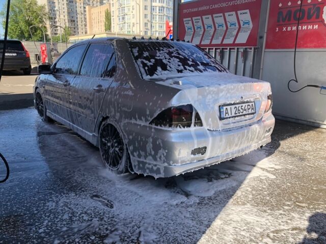 Серый Мицубиси Лансер, объемом двигателя 1.6 л и пробегом 380 тыс. км за 3800 $, фото 21 на Automoto.ua