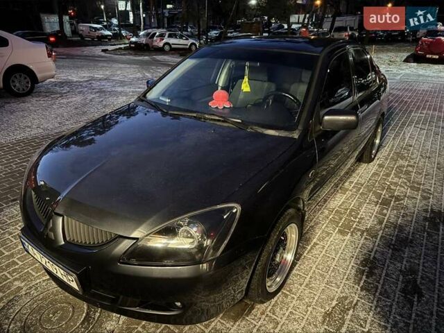 Сірий Міцубісі Lancer, об'ємом двигуна 1.6 л та пробігом 272 тис. км за 5100 $, фото 5 на Automoto.ua