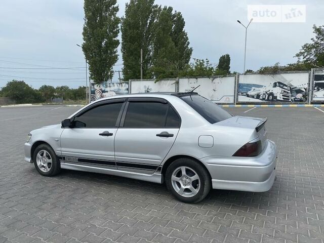 Сірий Міцубісі Lancer, об'ємом двигуна 2 л та пробігом 190 тис. км за 4500 $, фото 24 на Automoto.ua