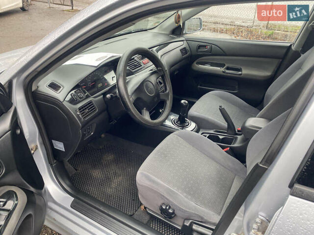 Сірий Міцубісі Lancer, об'ємом двигуна 1.6 л та пробігом 171 тис. км за 4600 $, фото 7 на Automoto.ua