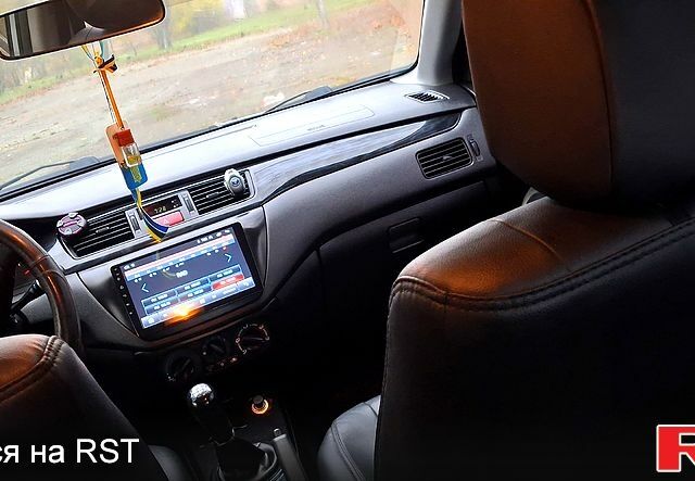 Сірий Міцубісі Lancer, об'ємом двигуна 1.6 л та пробігом 213 тис. км за 4400 $, фото 3 на Automoto.ua