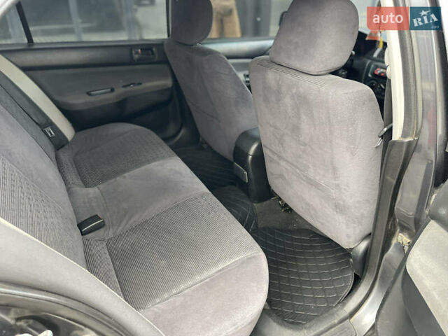 Сірий Міцубісі Lancer, об'ємом двигуна 1.6 л та пробігом 250 тис. км за 3300 $, фото 9 на Automoto.ua
