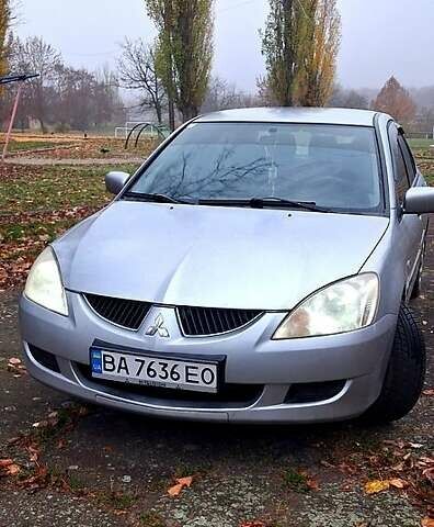 Сірий Міцубісі Lancer, об'ємом двигуна 1.6 л та пробігом 213 тис. км за 4400 $, фото 4 на Automoto.ua