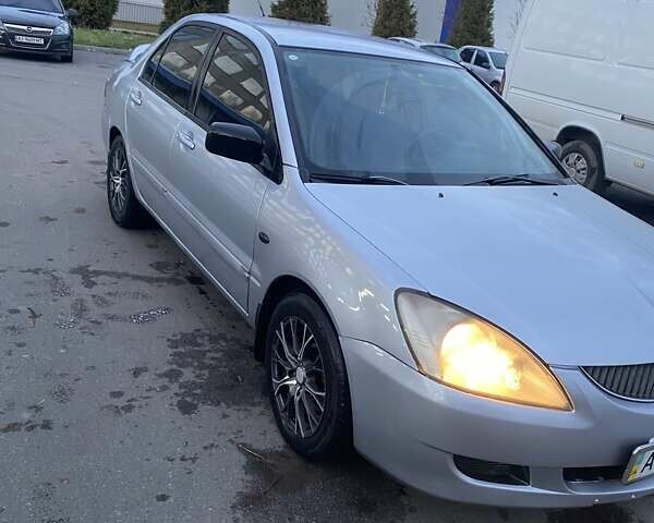 Мицубиси Лансер 2003 в Белой Церкве на Automoto.ua Серый Мицубиси Лансер, объемом двигателя 1.58 л и пробегом 350 тыс. км за 3300 $, фото 2 на Automoto.ua