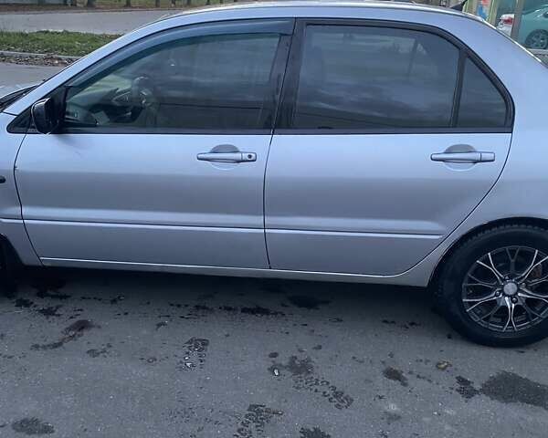 Мицубиси Лансер 2003 в Белой Церкве на Automoto.ua Серый Мицубиси Лансер, объемом двигателя 1.58 л и пробегом 350 тыс. км за 3300 $, фото 6 на Automoto.ua