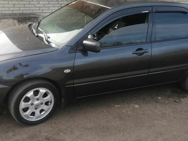 Сірий Міцубісі Lancer, об'ємом двигуна 1.6 л та пробігом 345 тис. км за 0 $, фото 5 на Automoto.ua